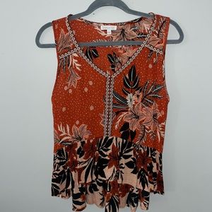 Orange floral Patron of Peace top